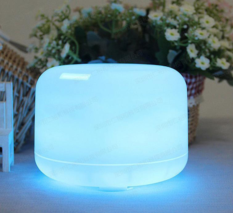 Máy phun sương mini MEI trụ trong 300ml đèn led 7 màu có remote tạo độ ẩm xông phun khuếch tán phun tinh dầu ultrasonic tỏa hương thơm