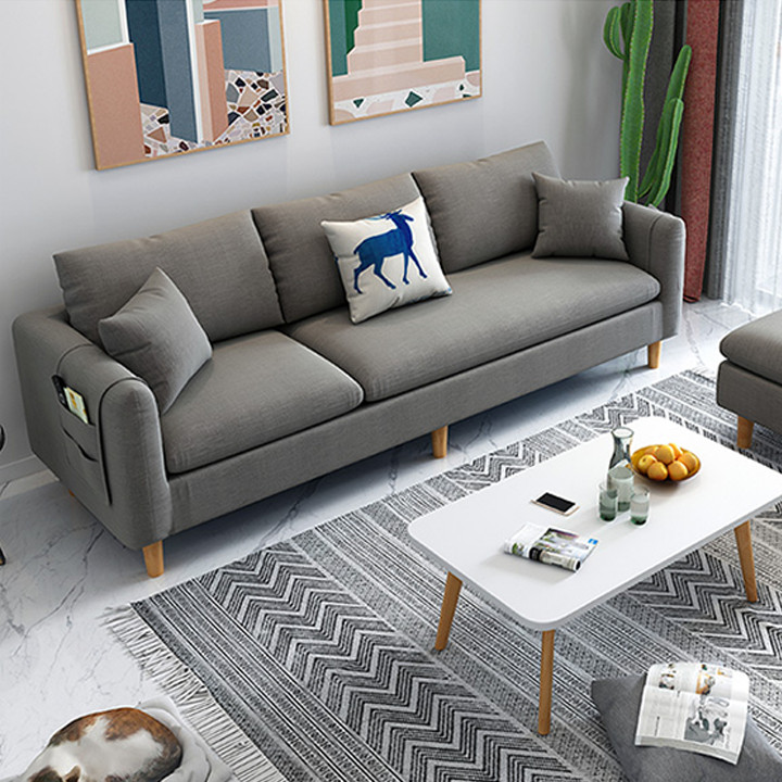 Sofa phòng khách hình chữ L chất liệu vải cao cấp tặng kèm gối  Kích thước: 210*142*78cm Chất Liệu: Khung gỗ bọc vải lanh cao cấp có thể tháo ra giặt, đệm bọt biển