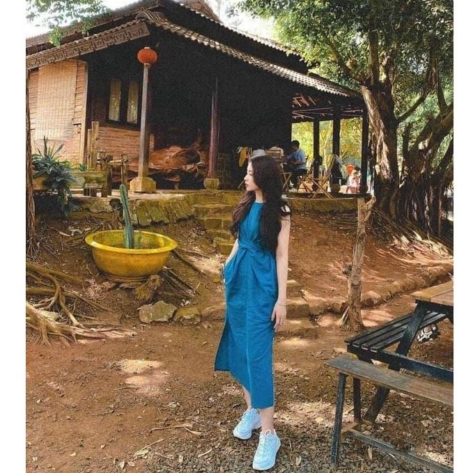 Đầm suông đũi xoắn eo xẻ tà y hình