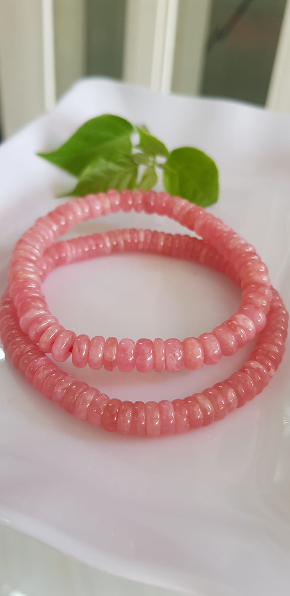 Vòng tay Mới Đá Đào Hoa tự nhiên bánh xe hồng đẹp 6,5mm Màu hồng tươi bóng đẹp Nữ mệnh hỏa, mệnh thổ ạ Công dụng may mắn, tài lộc, tốt sức khỏe, xinh đẹp tay ạ