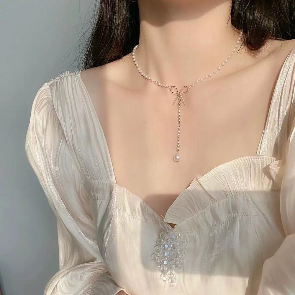 Vòng Cổ Choker Dáng Dài Đính Nơ Và Ngọc Trai Phong Cách Hàn Quốc