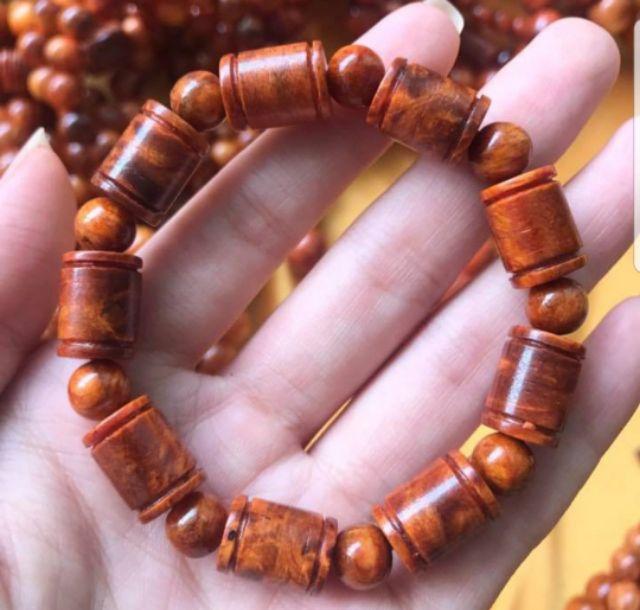 Vòng tay gỗ nu huyết long đốt trúc hạt tròn 10 m m
