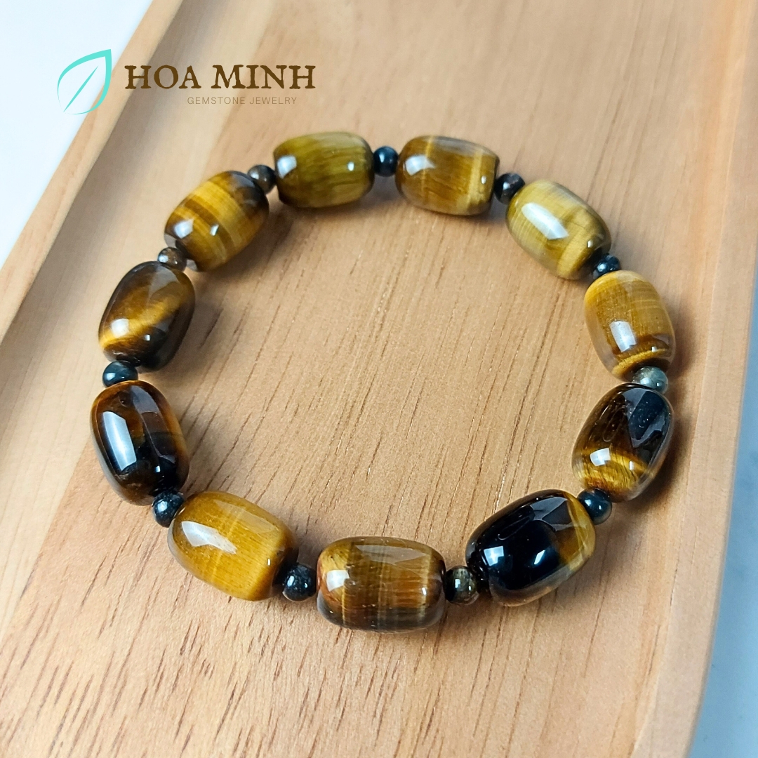 Vòng tay đá Mắt Hổ vàng nâu size 14x10 li chất 4A kiểu lu thống phối xen kẽ viên mắt hổ tròn