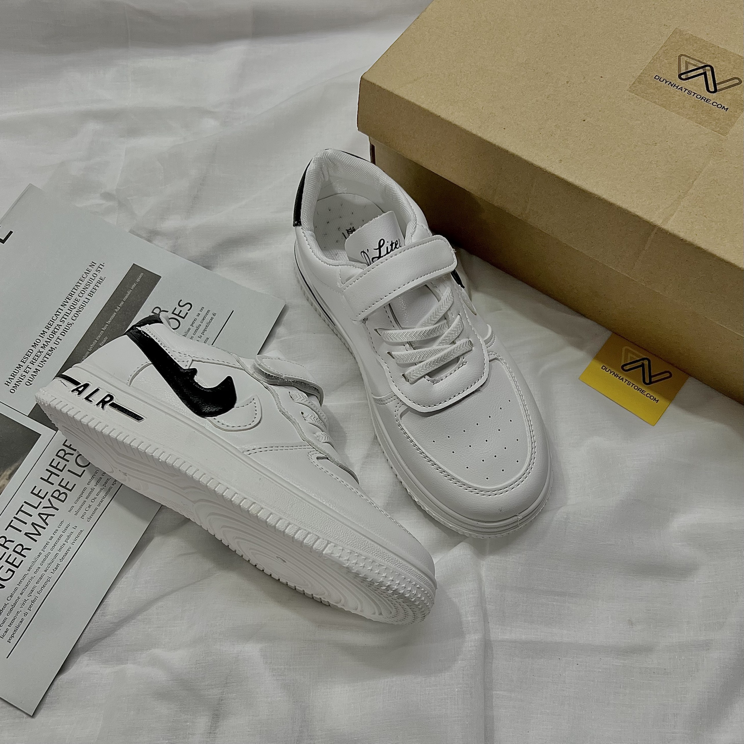 Giày Thể Thao Em Bé Trai Gái Móc Màu Trắng Đen Nai Duy Nhật Store Sang Uzzang Đẹp Êm Sneaker Bata Trend Size Lớn Dán Dây