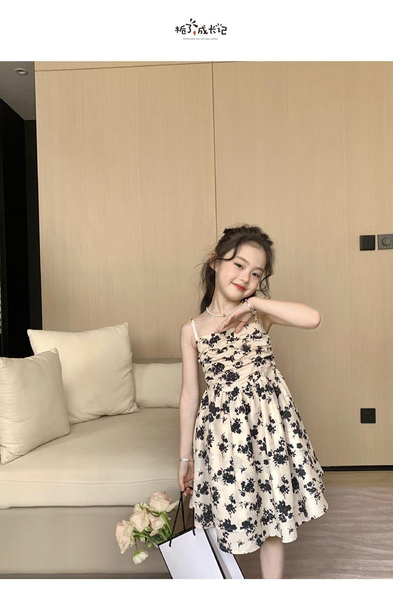 SHUANGYAN Yuanbaoth trẻ em ăn mặc thời trang phù hợp với phong cách phương Tây mùa xuân ăn mặc trẻ em gái mảnh hoa sling váy dệt kim áo choàng