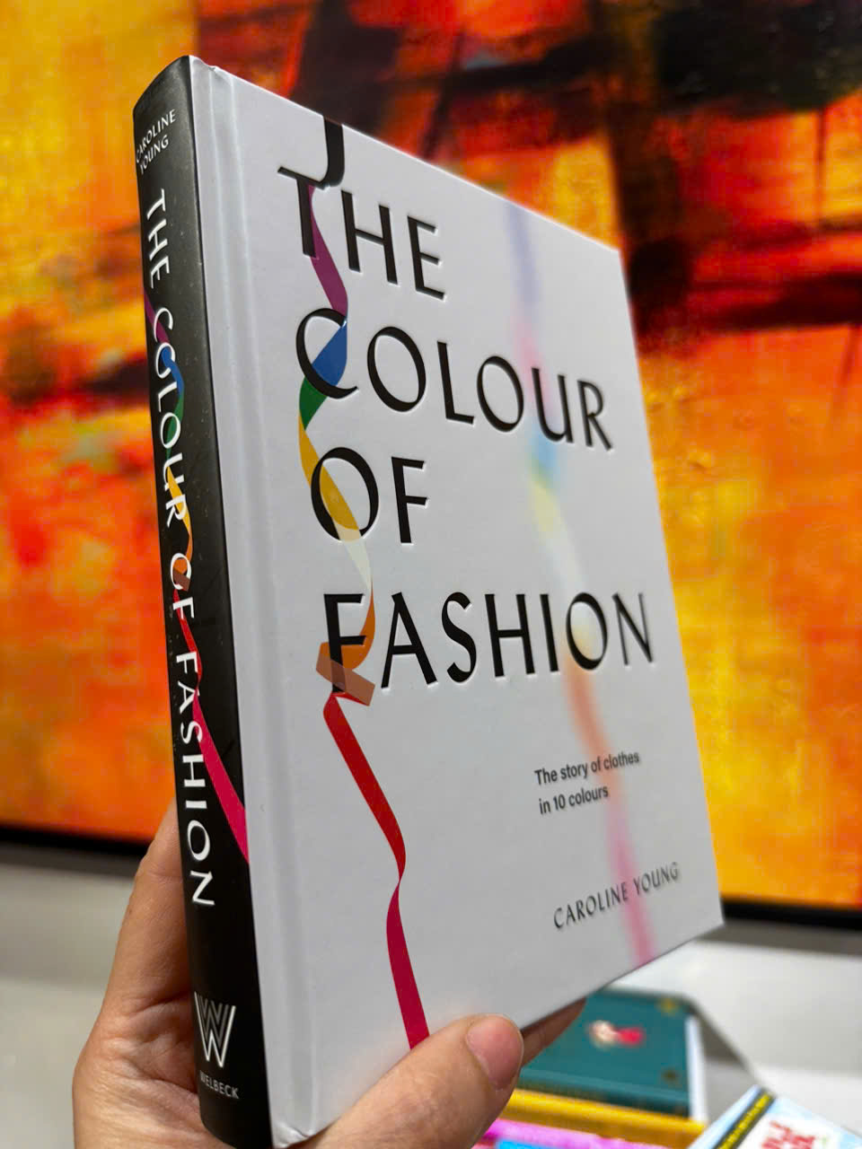 Sách - The Colour of Fashion: The Story of Clothes in Ten Colours by Caroline Young - Sách nghệ thuật, tiếng anh