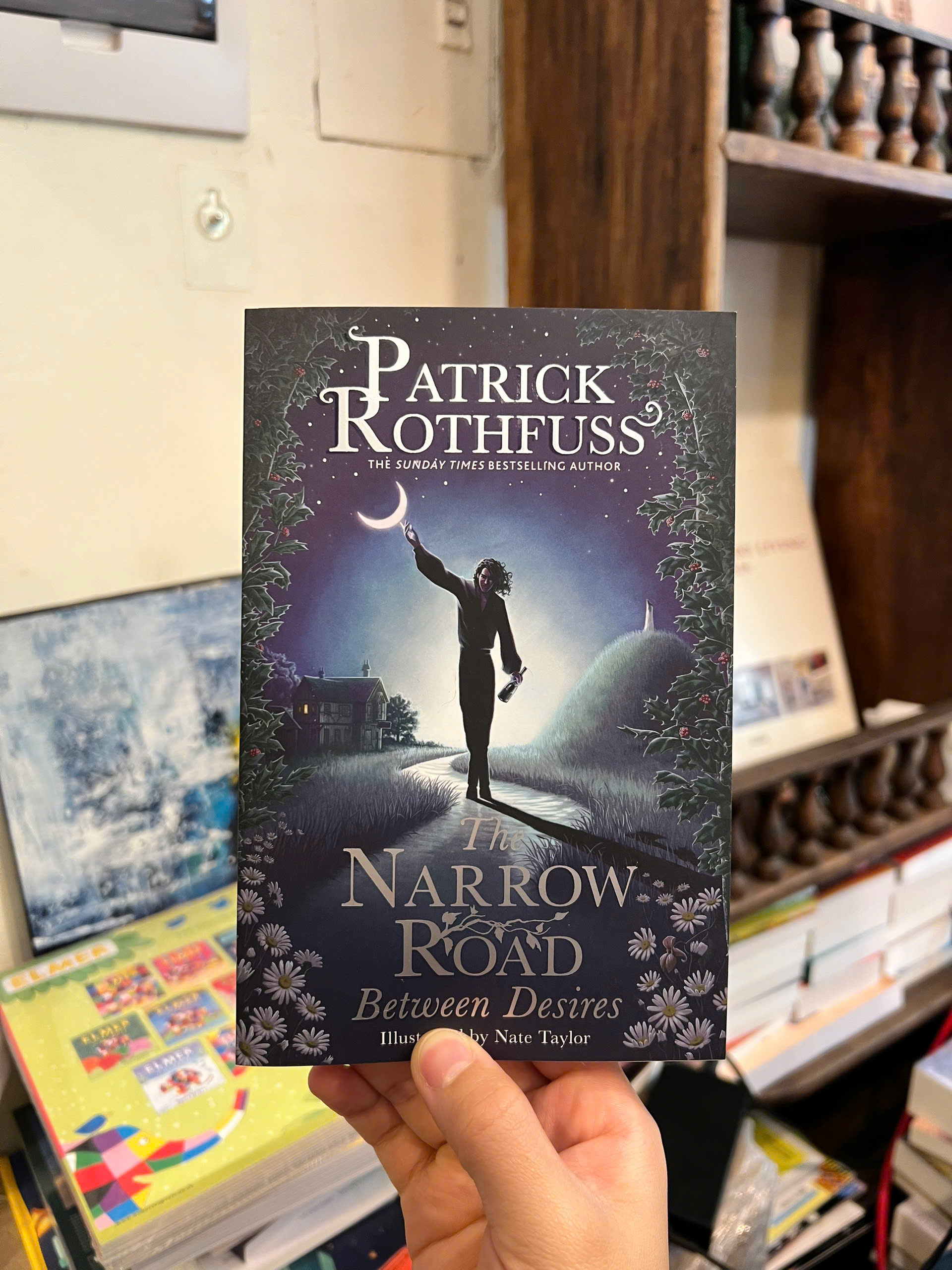 Sách - The Narrow Road Between Desires by Patrick Rothfuss | Fantasy / Young Adult / Ngoại văn