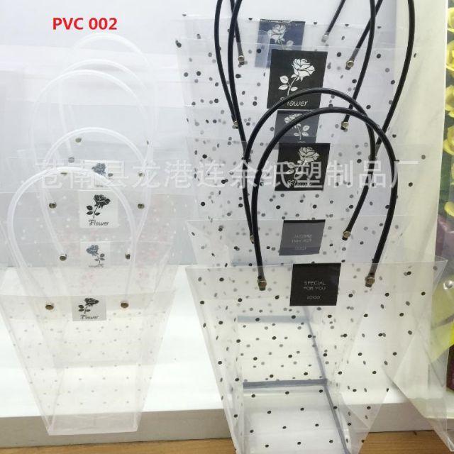 1 túi kính chấm bi đựng hoa.×42 cm