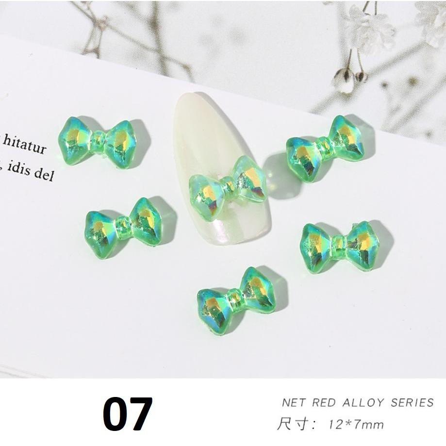Charm nơ tráng gương cầu vòng đính móng BYH004