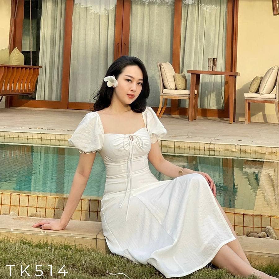 Đầm xòe xẻ tà tay phồng khoét ngực buộc dây có 3 màu