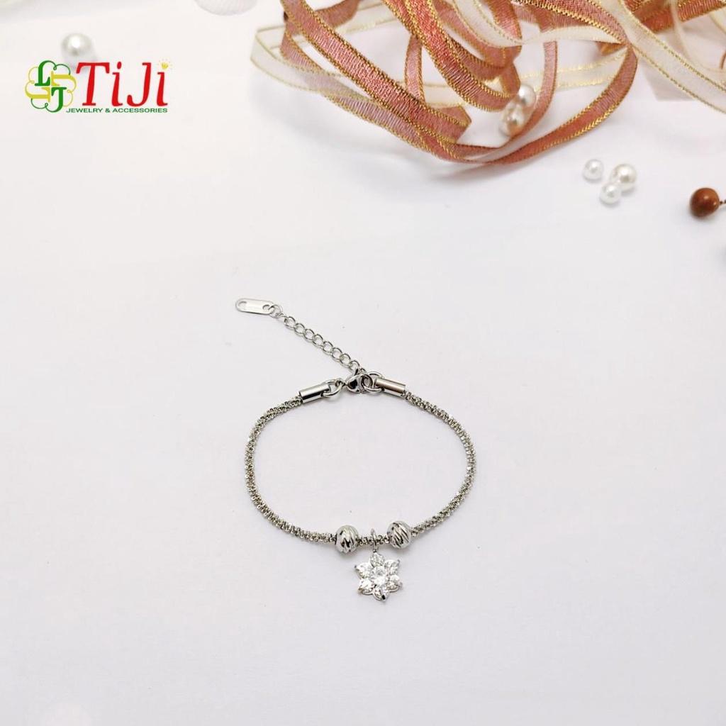 Lắc tay nữ inox kiểu xoắn xỏ bi chạm chiếu rớt hoa mai 6 cánh sáng đẹp không đen không gỉ sét