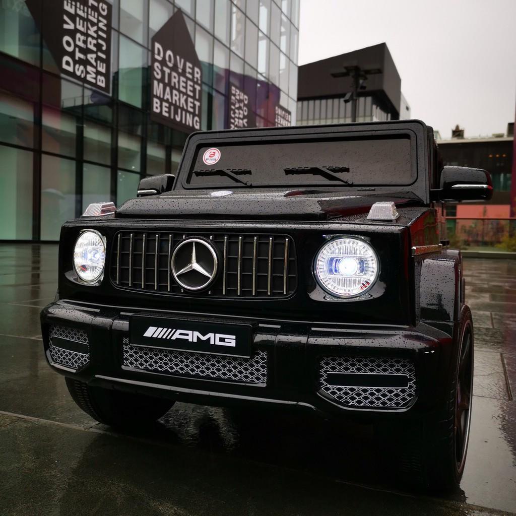 Ô tô xe điện MERCEDES G65 đồ chơi vận động cho bé ghế da 2 chỗ 4 động cơ (Đen-Đỏ-Trắng)