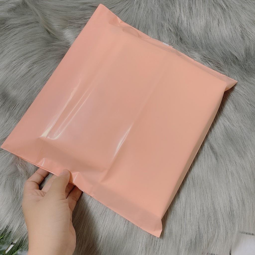 Túi gói hàng túi đóng hàng size 32x45cm cuộn 100 túi màu hồng đào loại bóng dẻo