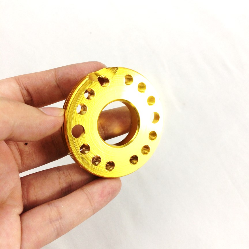 Thớt xoay bình xăng con màu vàng CNC