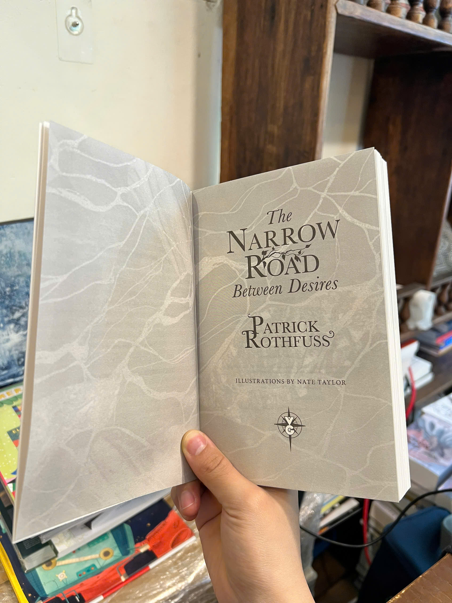 Sách - The Narrow Road Between Desires by Patrick Rothfuss | Fantasy / Young Adult / Ngoại văn