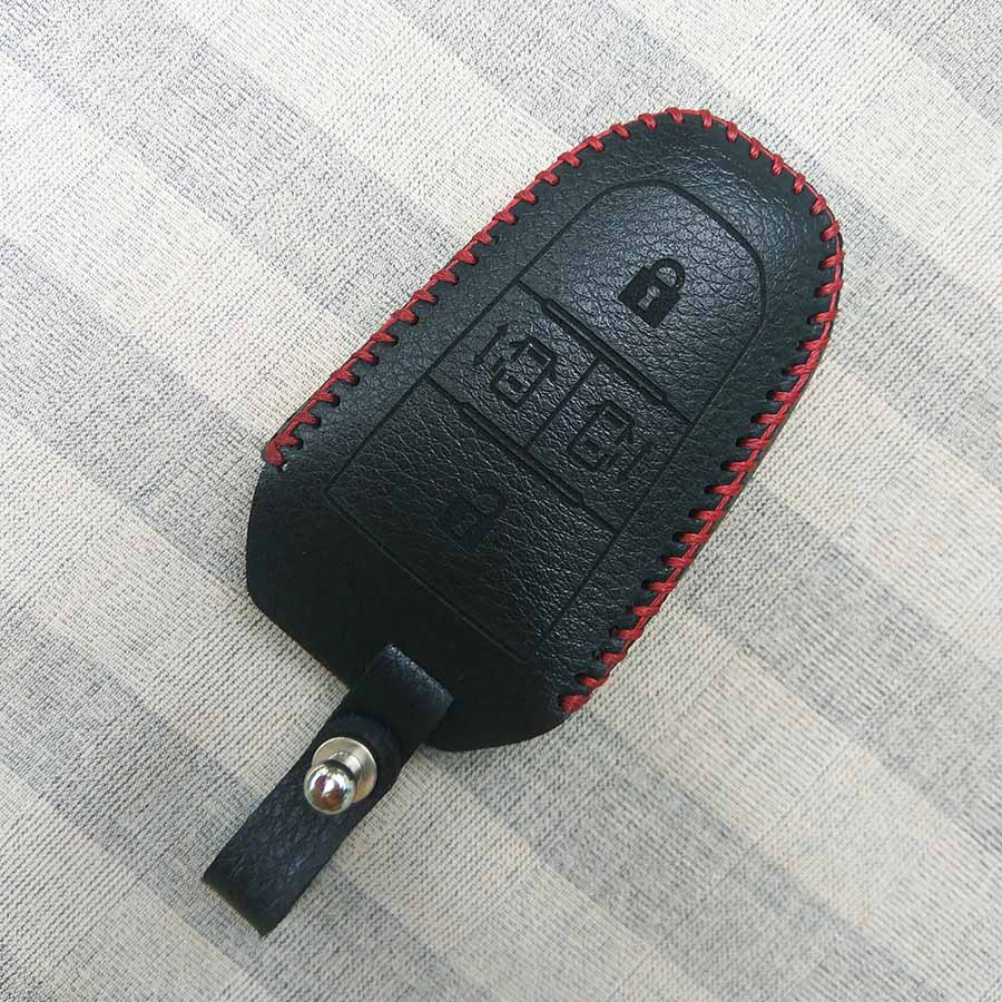 Bao da 4 nút chìa khóa smartkey cho xe hơi Peugeot Traveller (Đen)