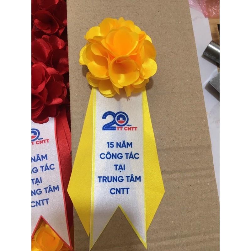 Hoa cài áo đại biểu