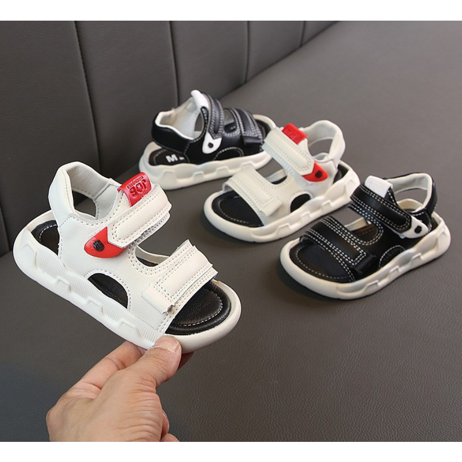 Giày Sandal Bé Trai Từ 2 Đến 5 Tuổi Đi Học, Đi Chơi, Chất Da PU Siêu Êm Mềm, Siêu Nhẹ, Quai Ngang Đơn Giản ( Trắng, Đen)