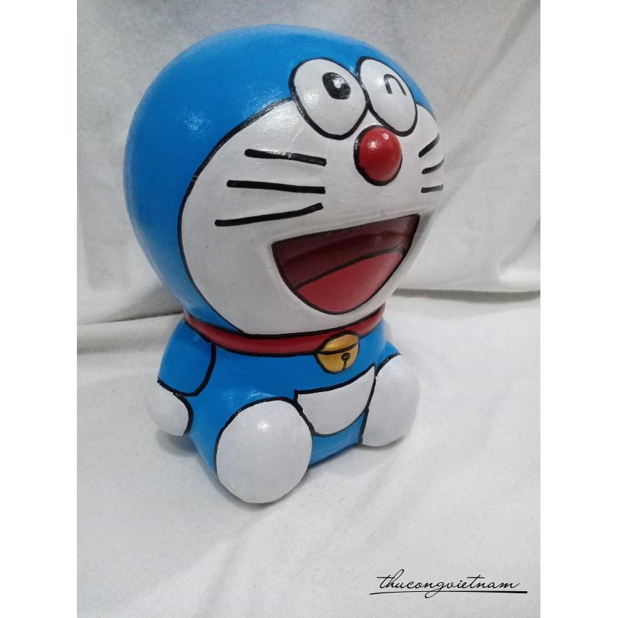 Heo đất Doraemon ngồi