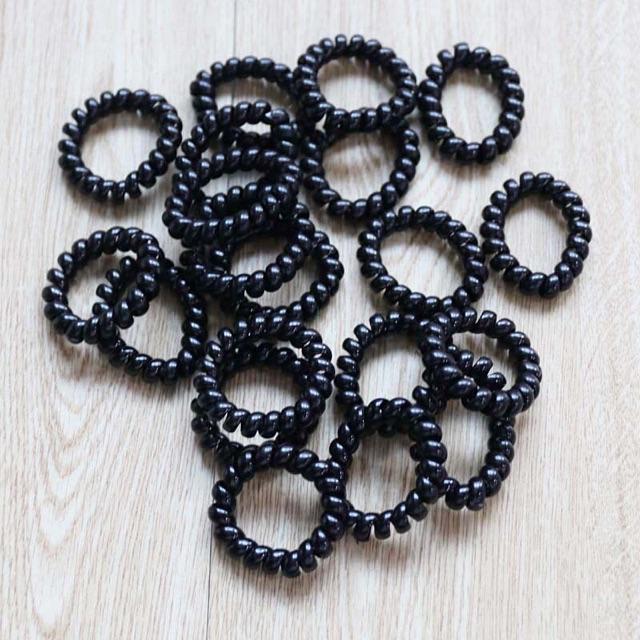 Chun buộc tóc lò xo:1c,màu đen,size to