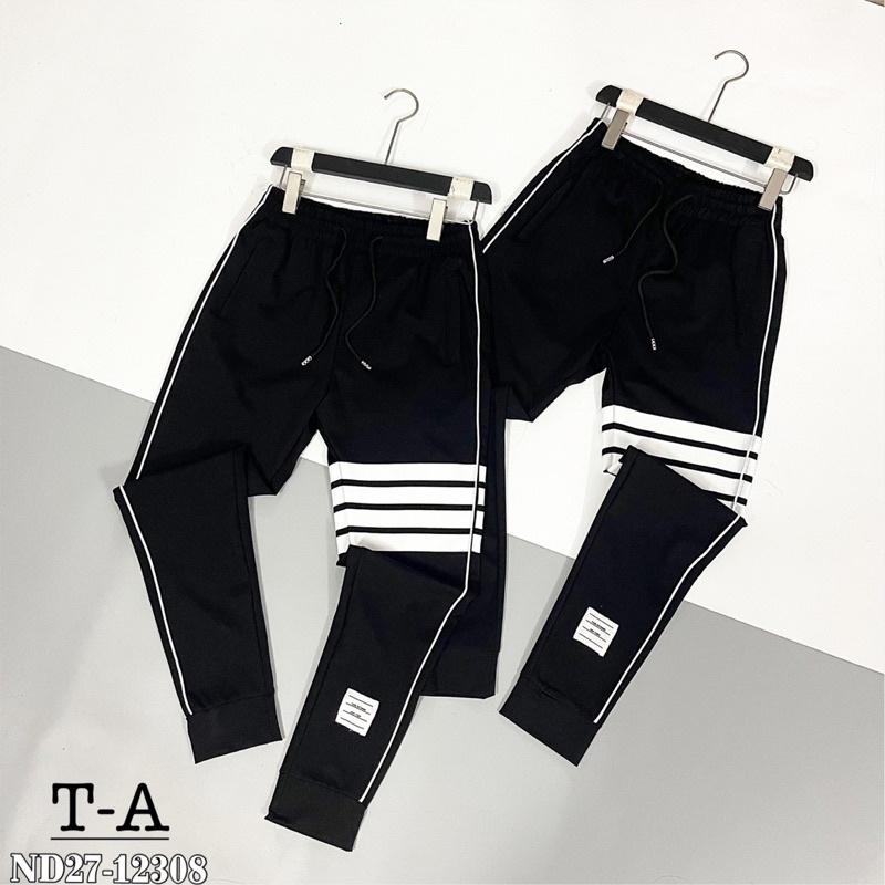 Quần Nỉ sọc 2 bên ống côn 4 sọc quanh đùi