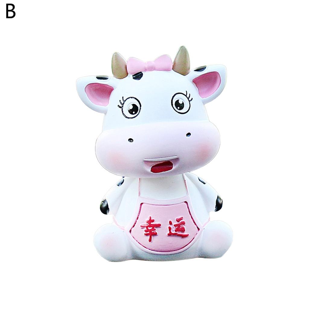 Mô Hình Bò Sữa Lắc Đầu Trang Trí Xe Hơi