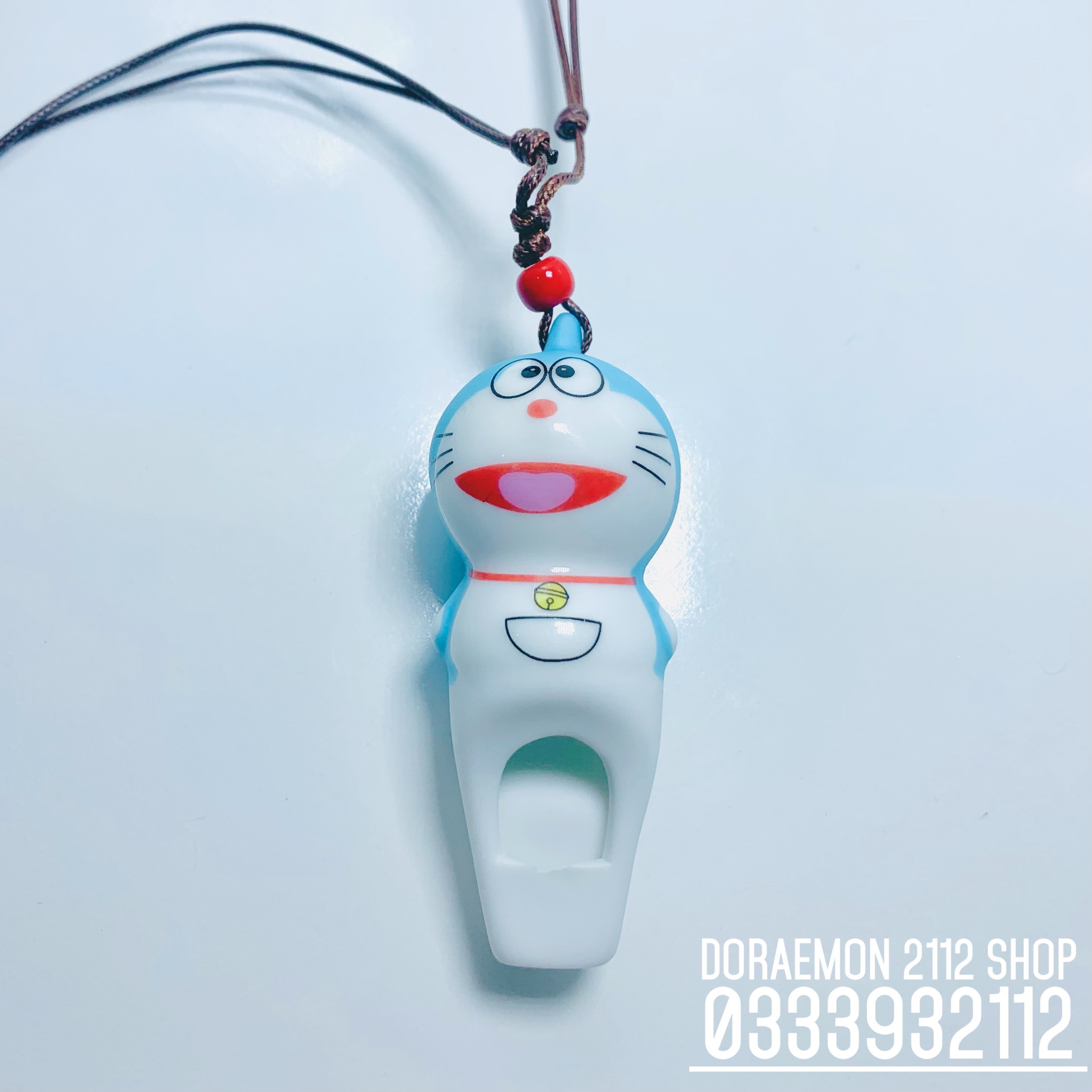 Còi báo hiệu bằng sứ Doraemon