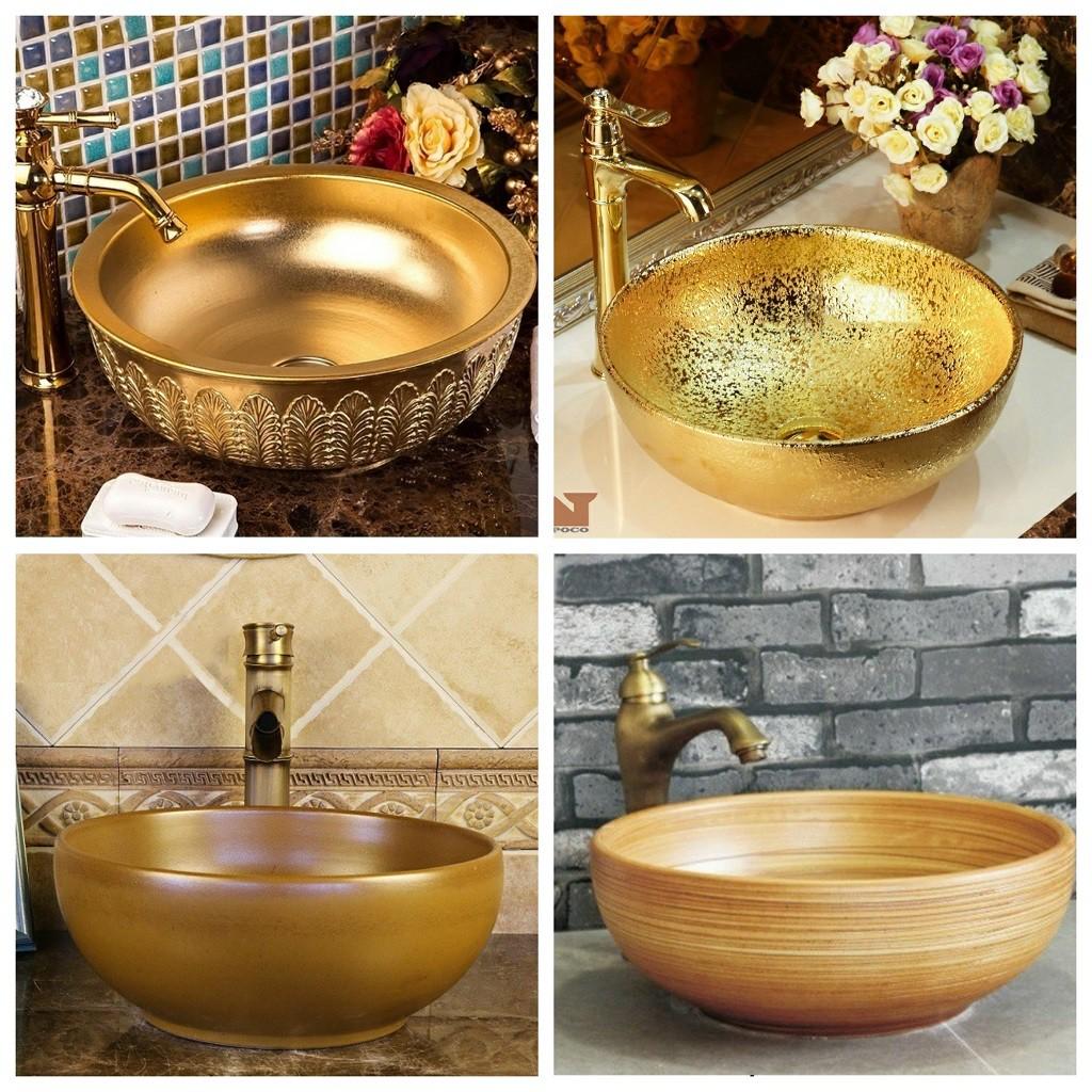 Chậu sứ lavabo để bàn hoa văn nghệ thuật với tông vàng chủ đạo