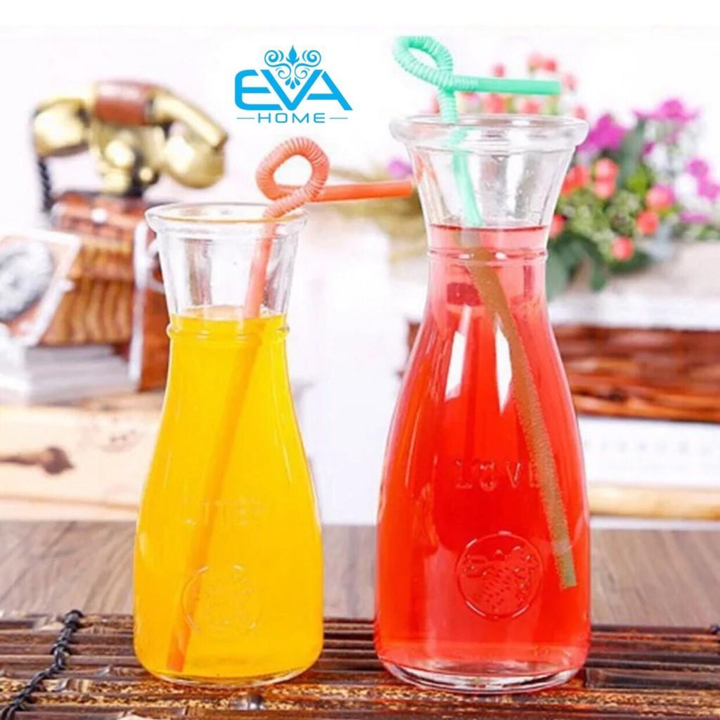 Một ly thủy tinh eo trong suốt đựng đồ uống hoặc cắm hoa loại 350ml kèm dây trang trí..