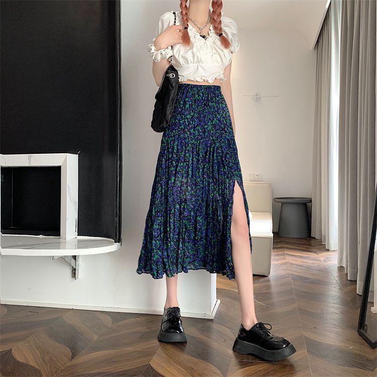 DONGSHOP Cao cấp hoa xẻ tà nửa người váy mùa xuân và mùa hè 2023 Vintage thả cảm thấy gầy váy xếp li một chữ dài váy