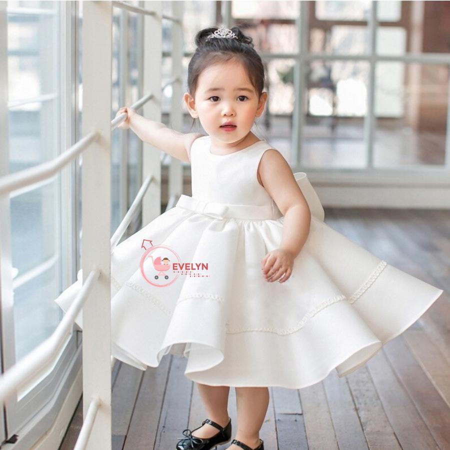 Đầm bé gái Satin trắng đính nơ sau lưng