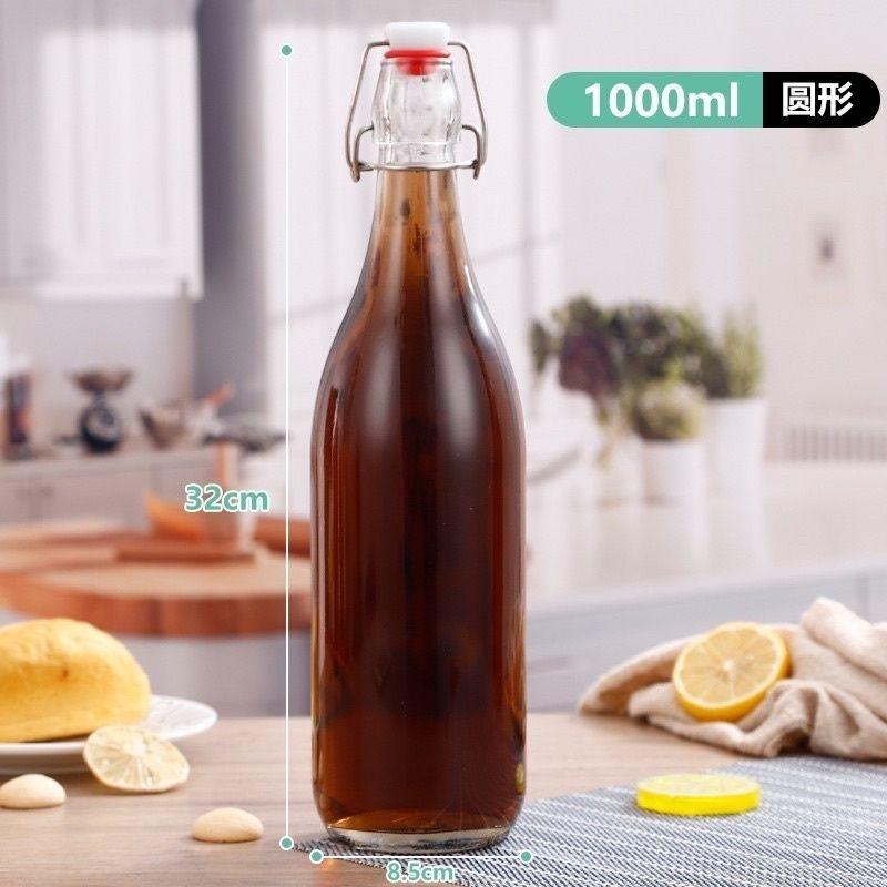 Chai thủy tinh nắp quai cài trong suốt