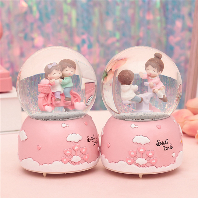 Hộp nhạc quả cầu tuyết xe đạp teen