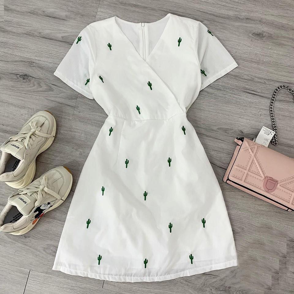 Đầm trắng xương rồng đắp chéo