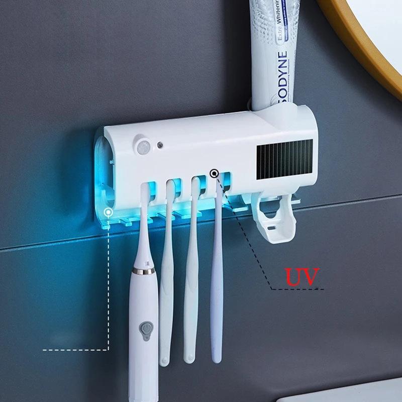 Giá đỡ bàn chải đánh răng có chức năng khử trùng bằng tia cực tím với đèn LED, Khe cắm chính cho 4 bàn chải đánh răng + Hộp đựng kem đánh răng 4 cốc màu trắng