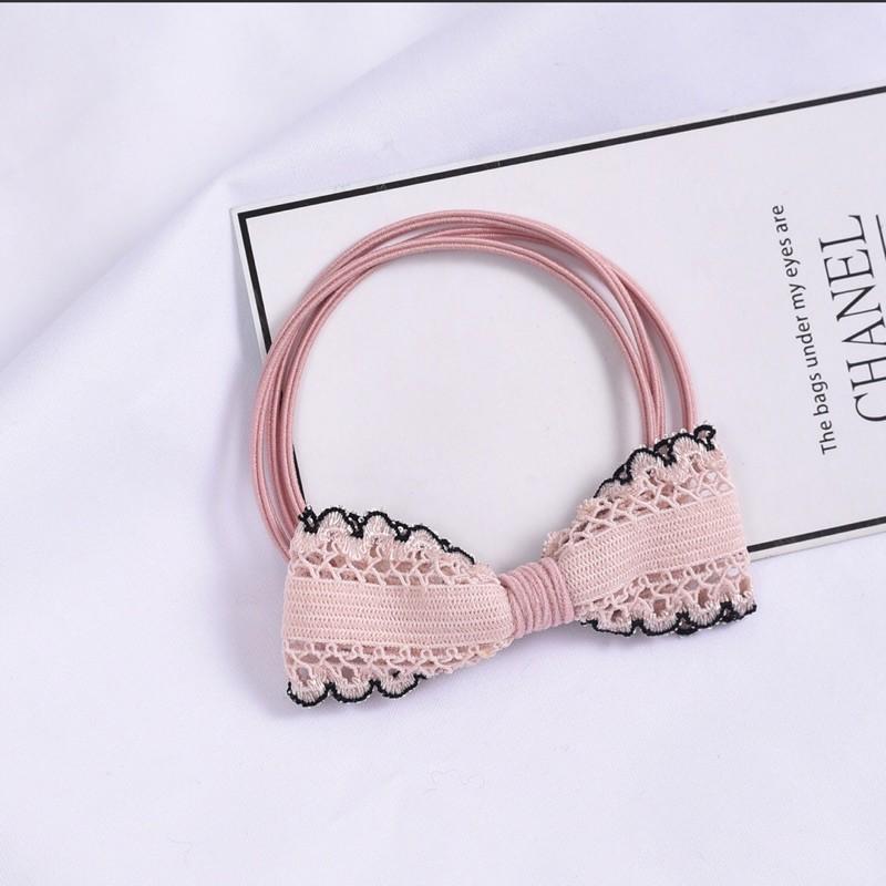 Thun buộc tóc hình nơ