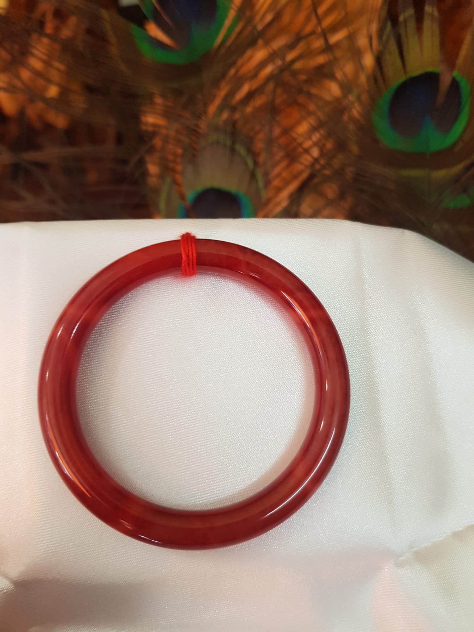 Vòng Nữ đá cẩm thạch Đỏ Đẹp 50mm x cọng 7,2mn Màu đỏ đậm vân vân đậm nhạt đều đẹp Nữ mệnh Hỏa Thổ 49kg - 54kg ạ