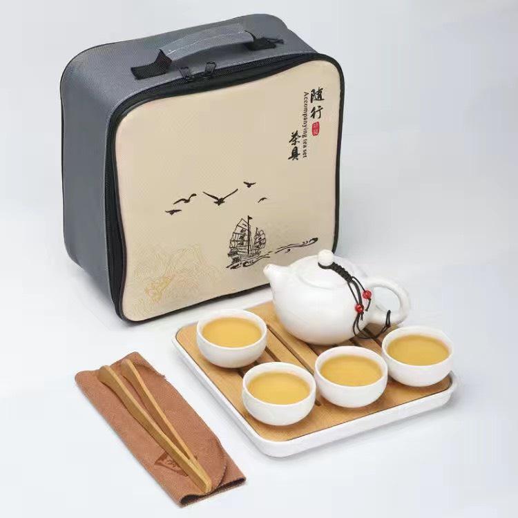 Bộ Ấm Pha Trà Đạo Đất Nung Gồm 4 Ly Và Dụng Cụ Pha Trà Cơ Bản Kèm Theo Túi Đựng Hình Vuông