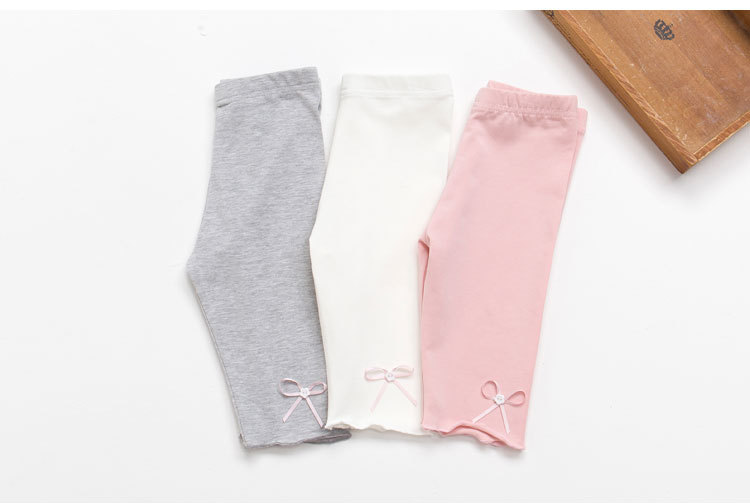 Quần legging dài cho bé gái Easy Baby họa tiết nơ, chất cotton thoáng mát cho bé từ 12-24kg (SL-037G)