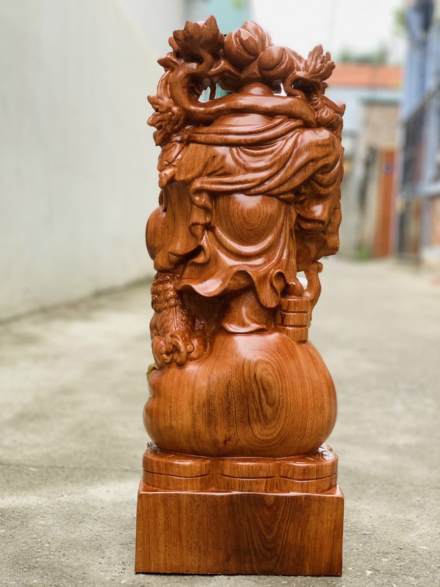 Tượng phật di lặc gánh cành đào bằng gỗ hương đá kt cao 60×24×14cm