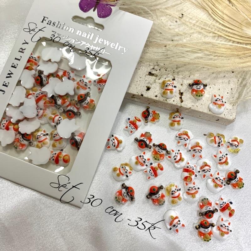 sét cham mèo thần tài
