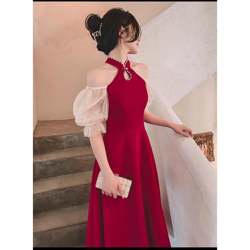 Đầm xoè cổ yếm đính cườm tay phối lưới kim sa