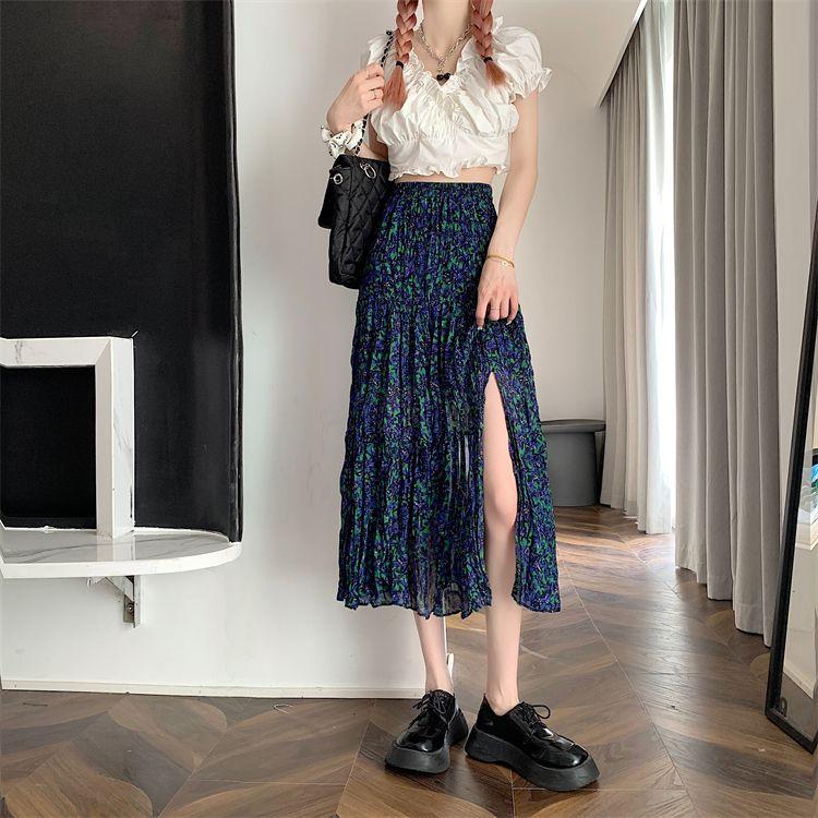 DONGSHOP Cao cấp hoa xẻ tà nửa người váy mùa xuân và mùa hè 2023 Vintage thả cảm thấy gầy váy xếp li một chữ dài váy
