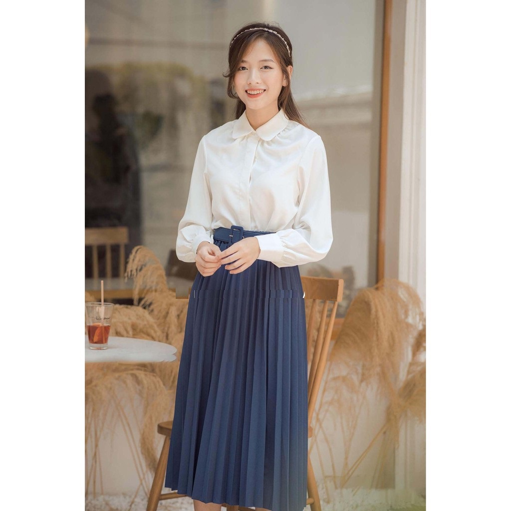 Chân váy xếp ly xòe kèm đai dáng dài qua gối vải lì, không nhũ, cạp chun, lưng cao