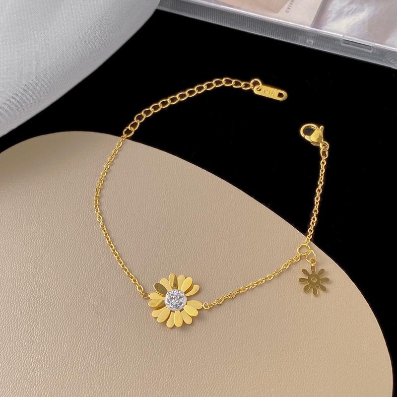 Vòng tay lắc tay nữ titan không đen hoa cúc vàng đẹp Ring House
