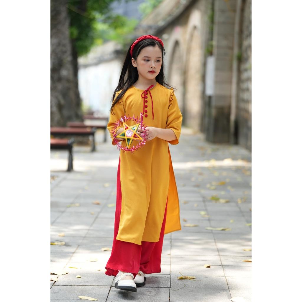 Áo dài bé gái BYZU thiết kế cách tân cổ tròn tay lỡ, vải lụa cao cấp màu vàng