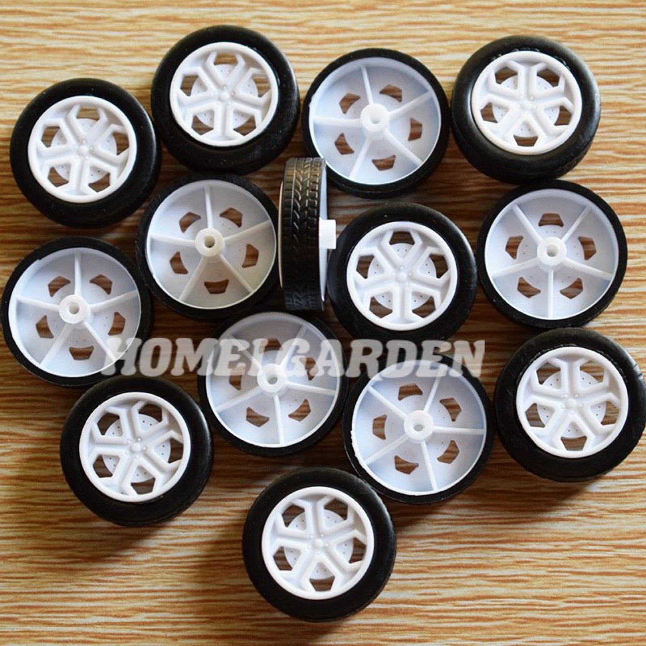 4 bánh xe cao su mini đường kính 26mm kèm 2 truc dài 100mm mô hình - HM0050