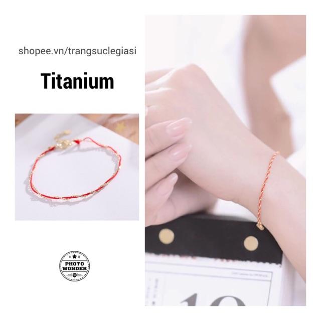 Vòng tay titan dây đỏ xoắn trơn
