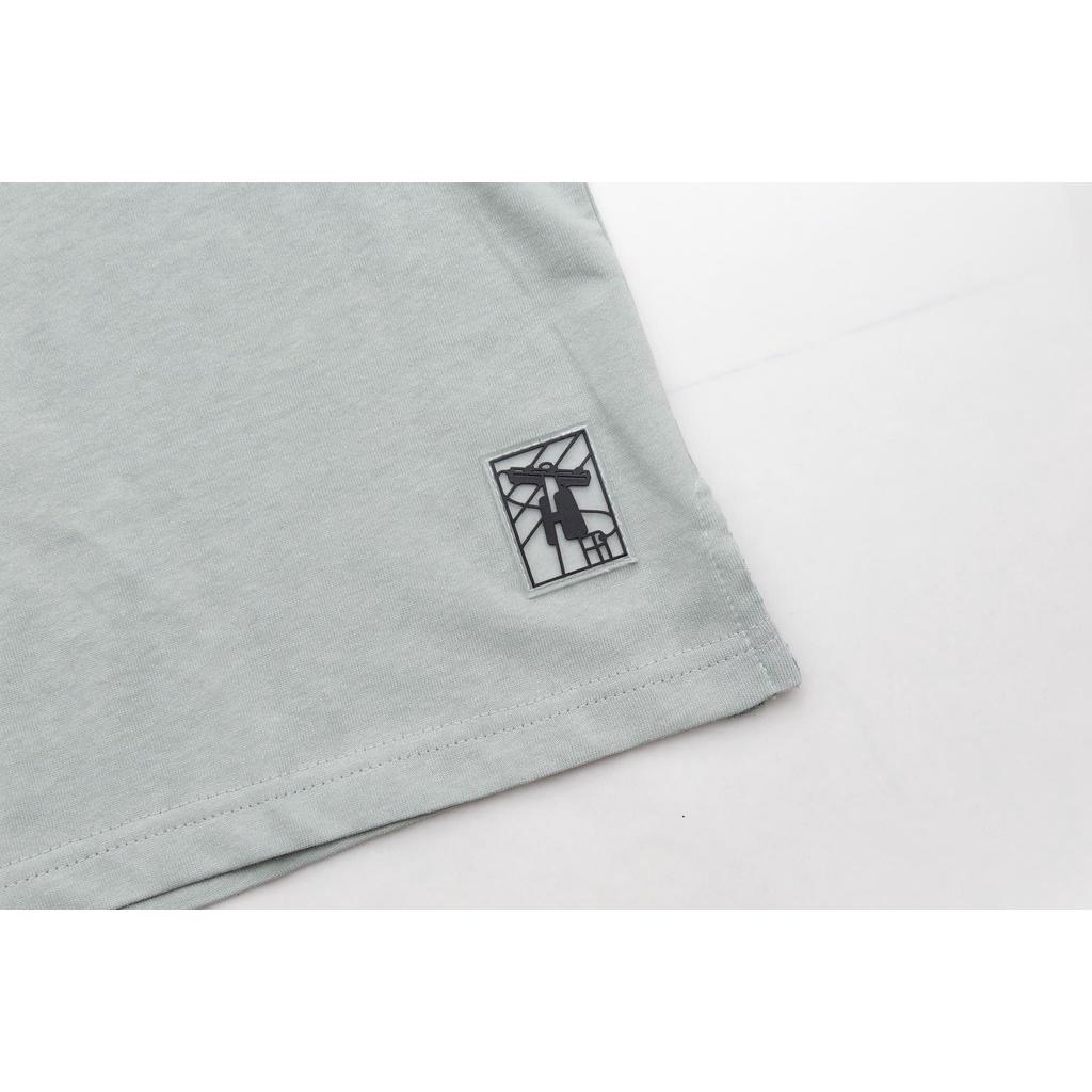 Áo Thun Unisex TeeHolic Thả Vai Xẻ Tà Màu Xanh Tiffany In Logo THS