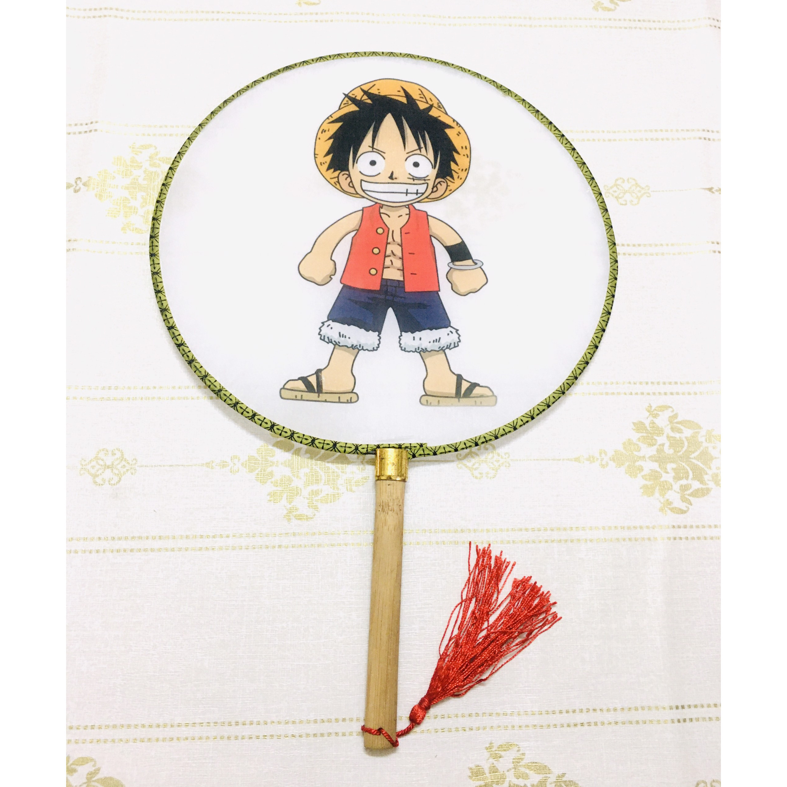 Qụat tròn cầm tay One Piece  phong cách cổ trang . cosplay cán gỗ dây tuyến